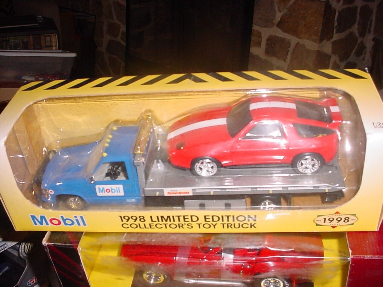 BOISE MARKETING FOR MOBIL------CAR CARRIER WITH PORSCHE